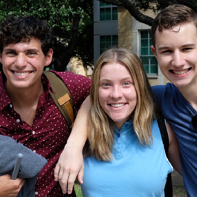 3 Honors students arm in arm